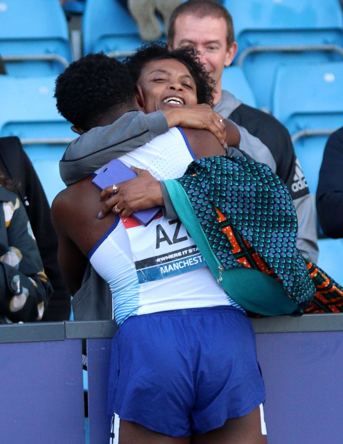 Jeremiah hugging his mum after winning his race at British Champs